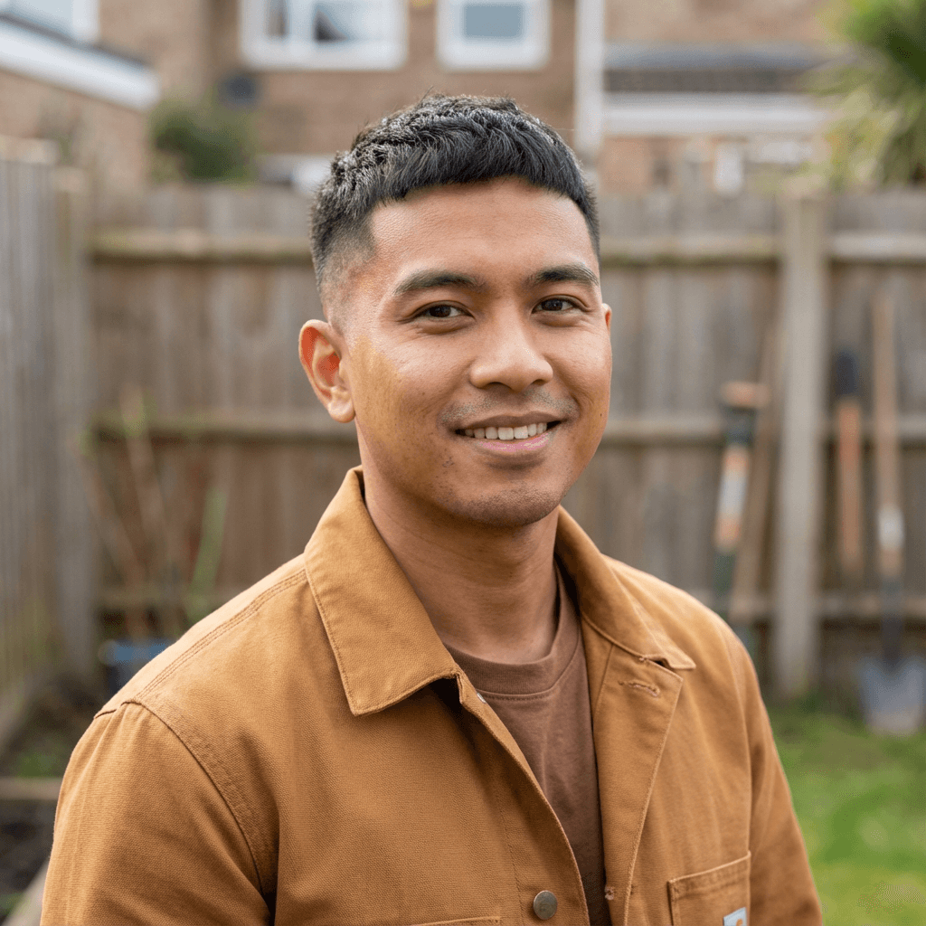 David Trinh smiling in a tidy home interior